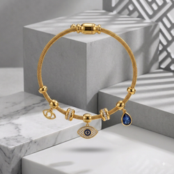 18K Gold Plated Evil Eye Twisted Cable Charm Bangle with Teardrop Blue Crystal and CZ Rondelles